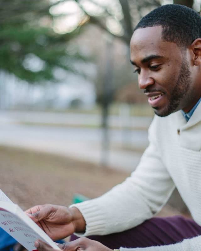 A man reading in the park