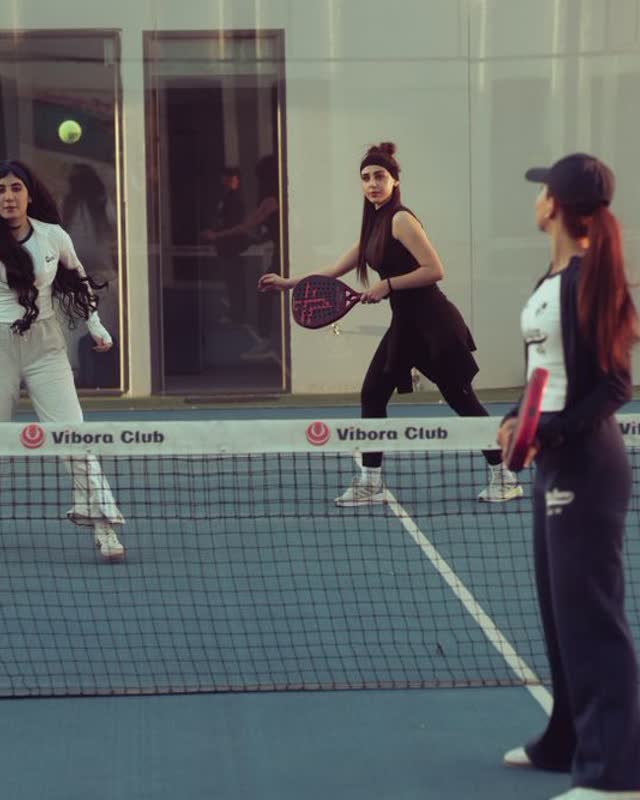 Friends playing padel in Baghdad